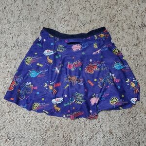 Playful Purple Graphic Running Skirt With Attached Shorts & Pockets